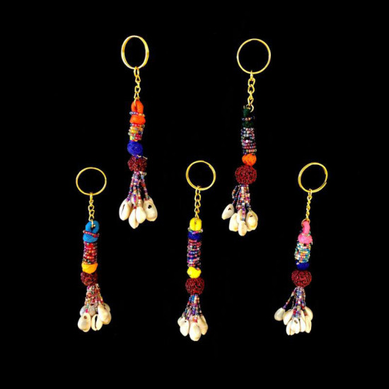 LLAVERO SEMILLA DE RUDRAKSHA CON CARACOL